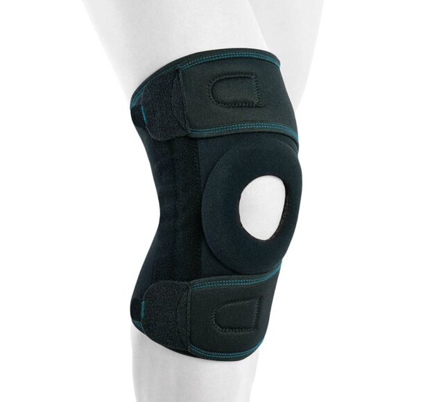 Image of a woman wearing the Actius Wrap-around Knee Brace with Side Reinforcements.