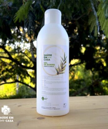 A bottle of Health In Your Home 1L Shower Gel on a wooden table.