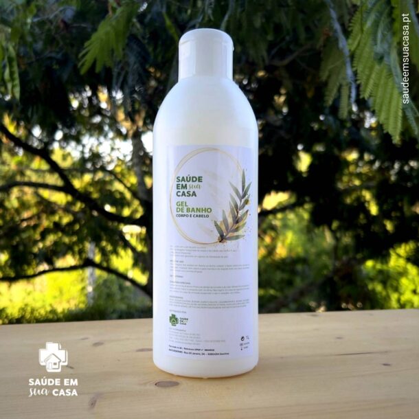 A bottle of Health In Your Home 1L Shower Gel on a wooden table.