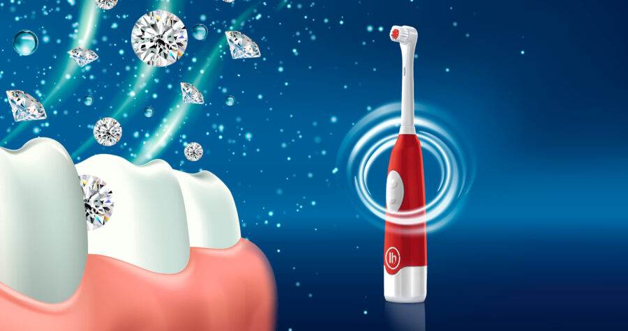 Une brosse à dents électrique propre avec des diamants qui volent autour.