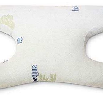 Una almohada CPAP de bambú azul y blanca.