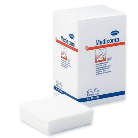 Caixa de Compressas Não Esterilizadas Medicomp - 100 Unidades sobre fundo branco.