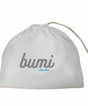 A white BUMI Baby Pillow with the word bumi written on it.