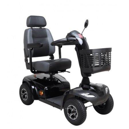 A black Orthos XXI Compact Deluxe 700 Scooter with a basket.