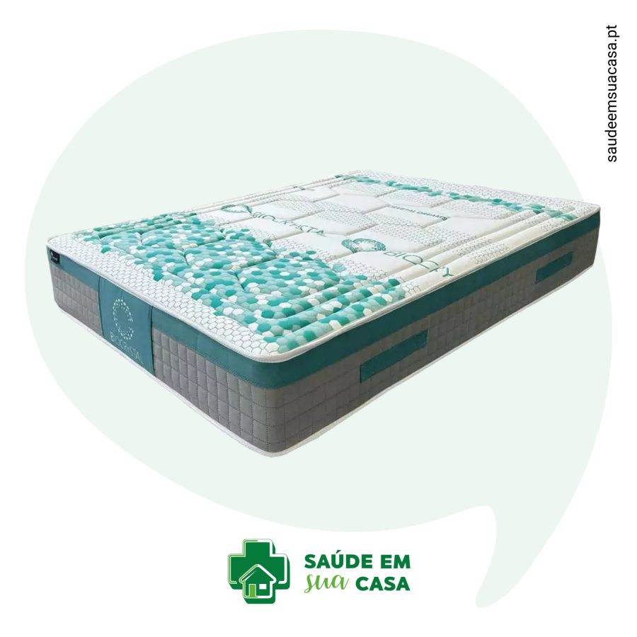 Matelas biocristal au design bleu et vert.