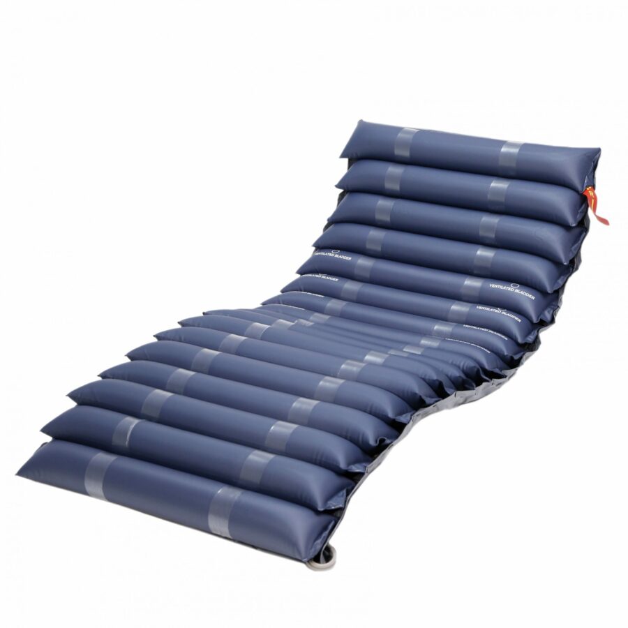 The Tubular Anti-decubitus Mattress with Compressor is a blue inflatable medical mattress with multiple air-filled sections and an integrated compressor to ensure patient comfort and provide anti-decubitus pressure relief.