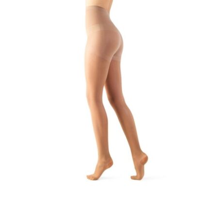 A person wearing transparent, nude-colored AT 140 DEN Lycra Rest tights stands on one leg with the other leg slightly bent. The image captures the lower body, from waist to toe.