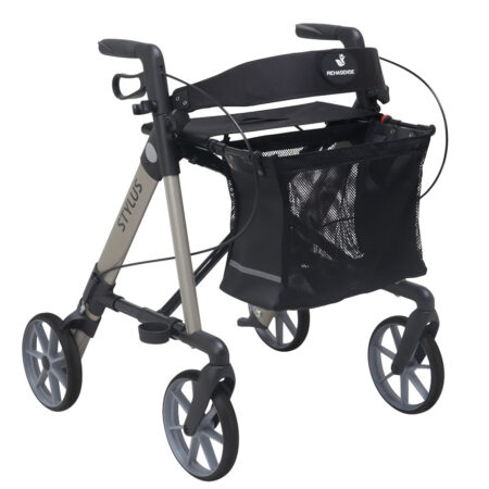 The Rollator Stylus is a four-wheeled walker with hand brakes, a mesh basket and a padded seat, providing mobility assistance.