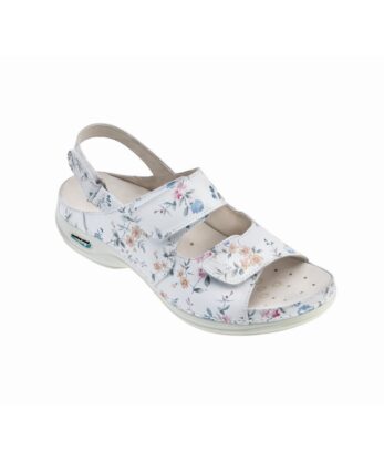 Sandalia blanca con estampado floral, puntera abierta, tira ajustable y tacón bajo, diseñada para ofrecer comodidad. Forma parte de la colección de sandalias Wash'Go Helsinkia.